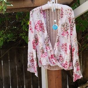 Bell sleeve faux wrap blouse